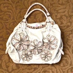 Nicole Lee- large off white faux leather shoulder bag with flower detail.